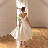 Robe de mariée épaules dénudées à nœud
