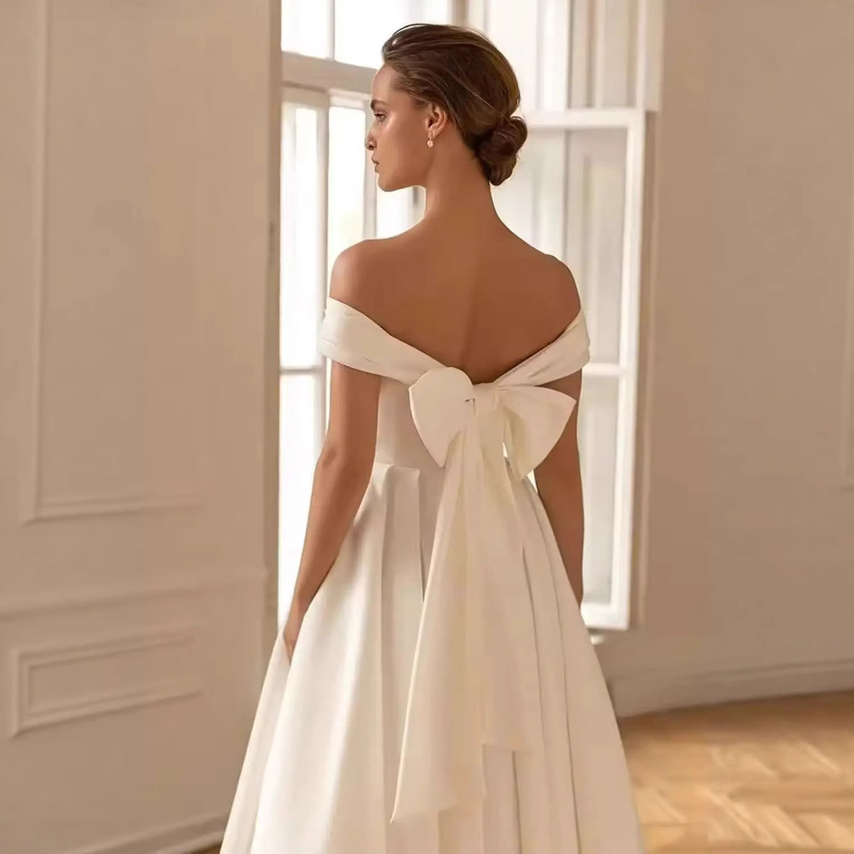 Robe de mariée épaules dénudées à nœud