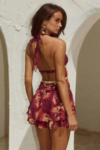 Robe dos nu imprimée à bretelles